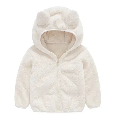 close-up of girls faux fur hooded winter jacket fabric texture showing soft material