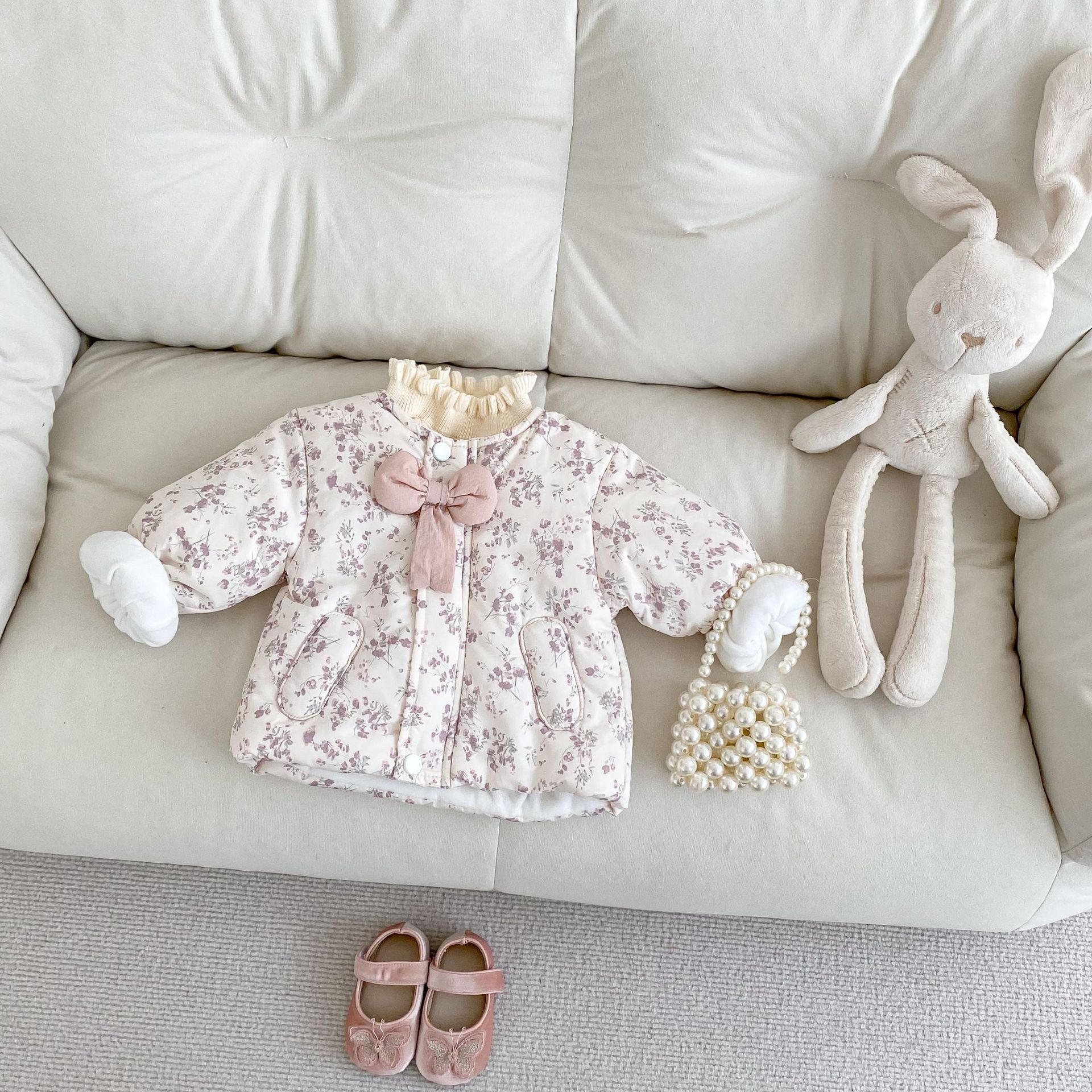 ホワイトカラーのベビーキルティングコート