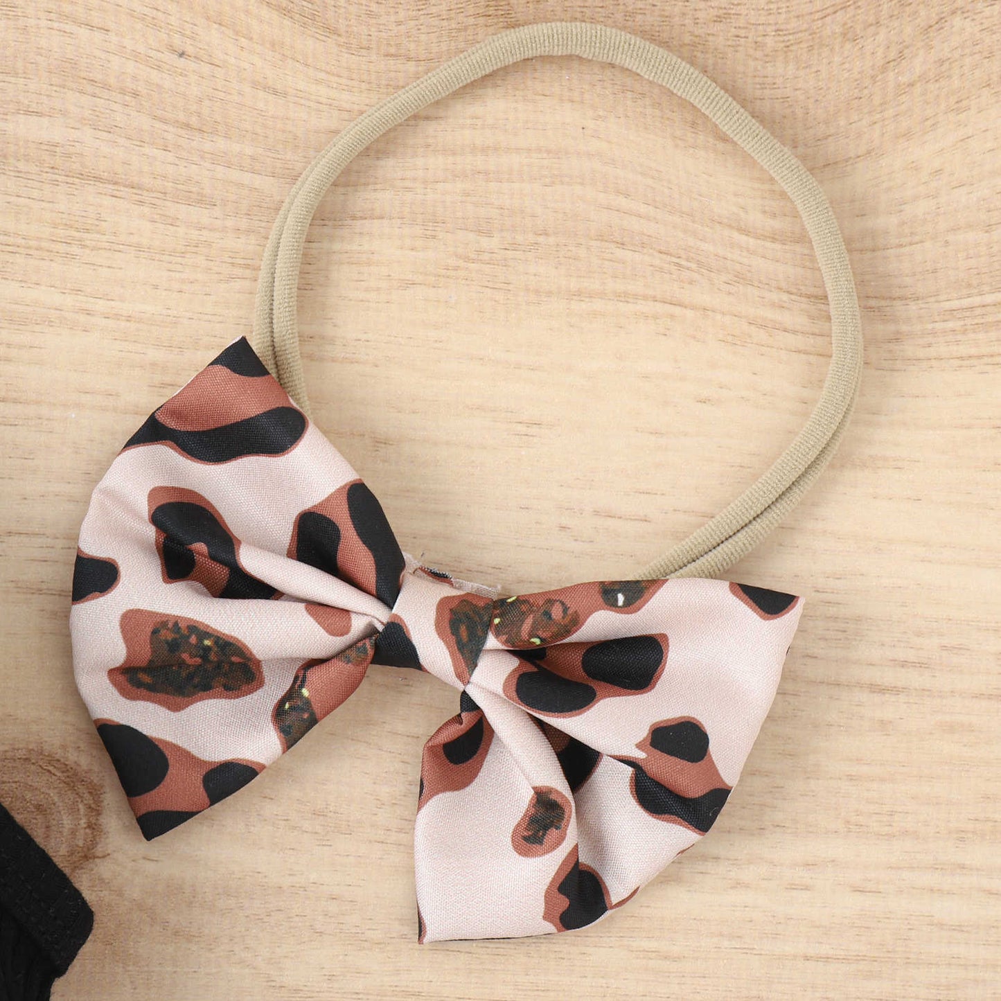 涼しげにおしゃれが完成する 女の子ホルターネックノースリーブ上下セット レオパード柄フリルスカート+リボンヘアバンド付き コットン95% 70~100cm