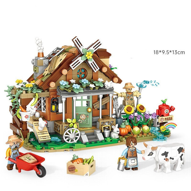 カラフルな組み立てパーティクルブロックで作られたストリート風コテージハウスのジオラマ。庭にはカボチャ、花、樹木、野菜、風車、手押し車、バスケットを持つ女の子フィギュア、牛のミニフィギュアなどが配置され、細部まで精巧に再現されたクリエイティブ知育ブロックセット。DIYブロック遊び、想像力トレーニング、空間認識、親子遊びに最適なキッズ用ビルディングトイ。
