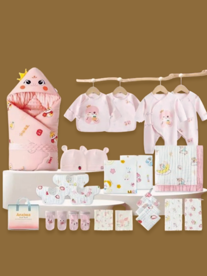 ピンク系デザインの新生児用純綿おくるみ26点ギフトセットをフルレイアウトで並べた画像
