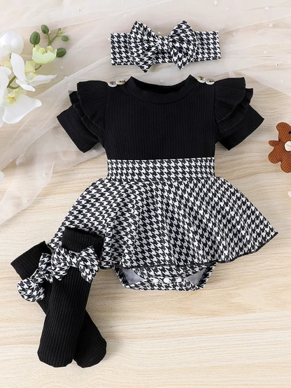 ブラックの半袖トップスと千鳥格子リボン付きヘアバンドが揃うベビードレス三点セット
