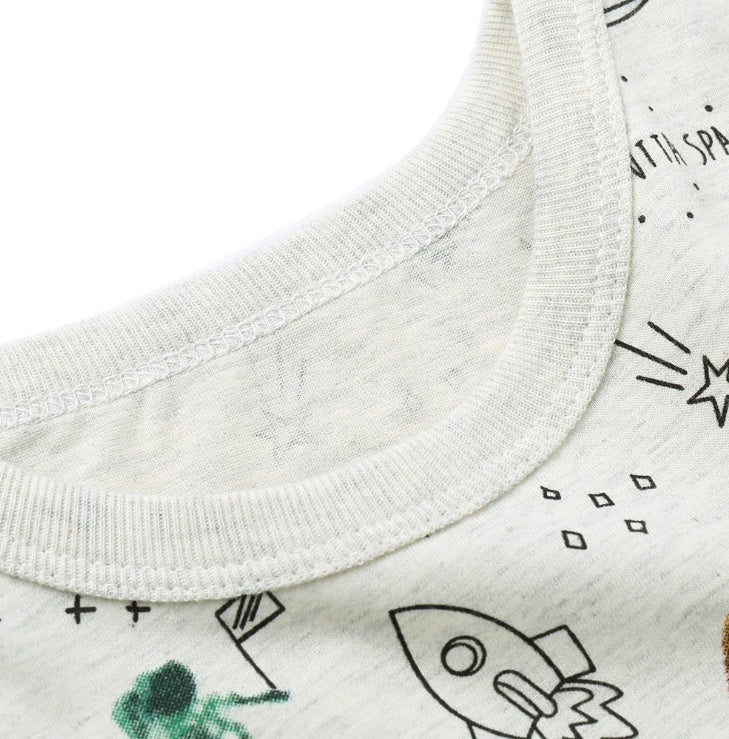 日差しに強くさらっと快適 子ども半袖Tシャツ 宇宙カートゥーン総柄 UVカット加工 コットン 90〜140cm