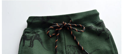 のびのび動けて毎日履きたくなる 子どもロングジョガーパンツ 恐竜総柄プリント コットンニット 2〜5歳