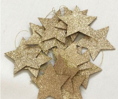 ゴールドの星形ガーランド（スターオーナメント）束のイメージ
