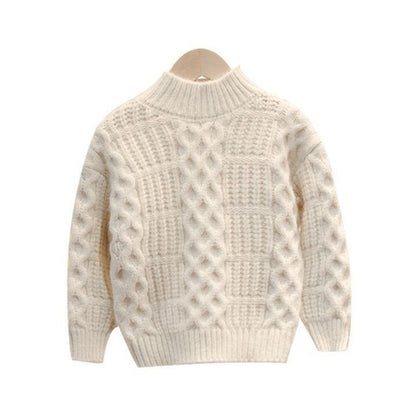 フロント部分の編み柄と質感が分かるキッズニットのクローズアップ写真
