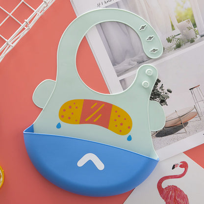 サッドデザインのベビー用シリコンお食事ビブ 立体ポケット付き（食べこぼし対策）
