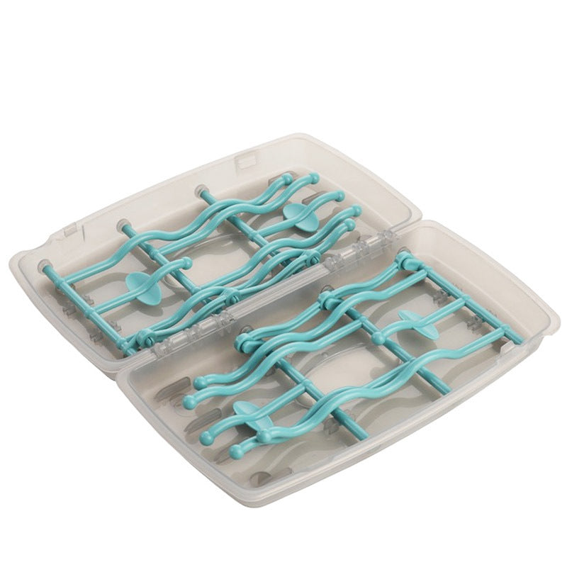 ピンクカラーのベビー用ボトル水切りラックとトレー部分のディテール
