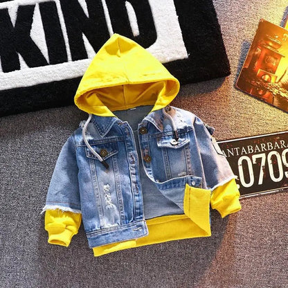 back view of boys denim jacket with star patch and yellow hood