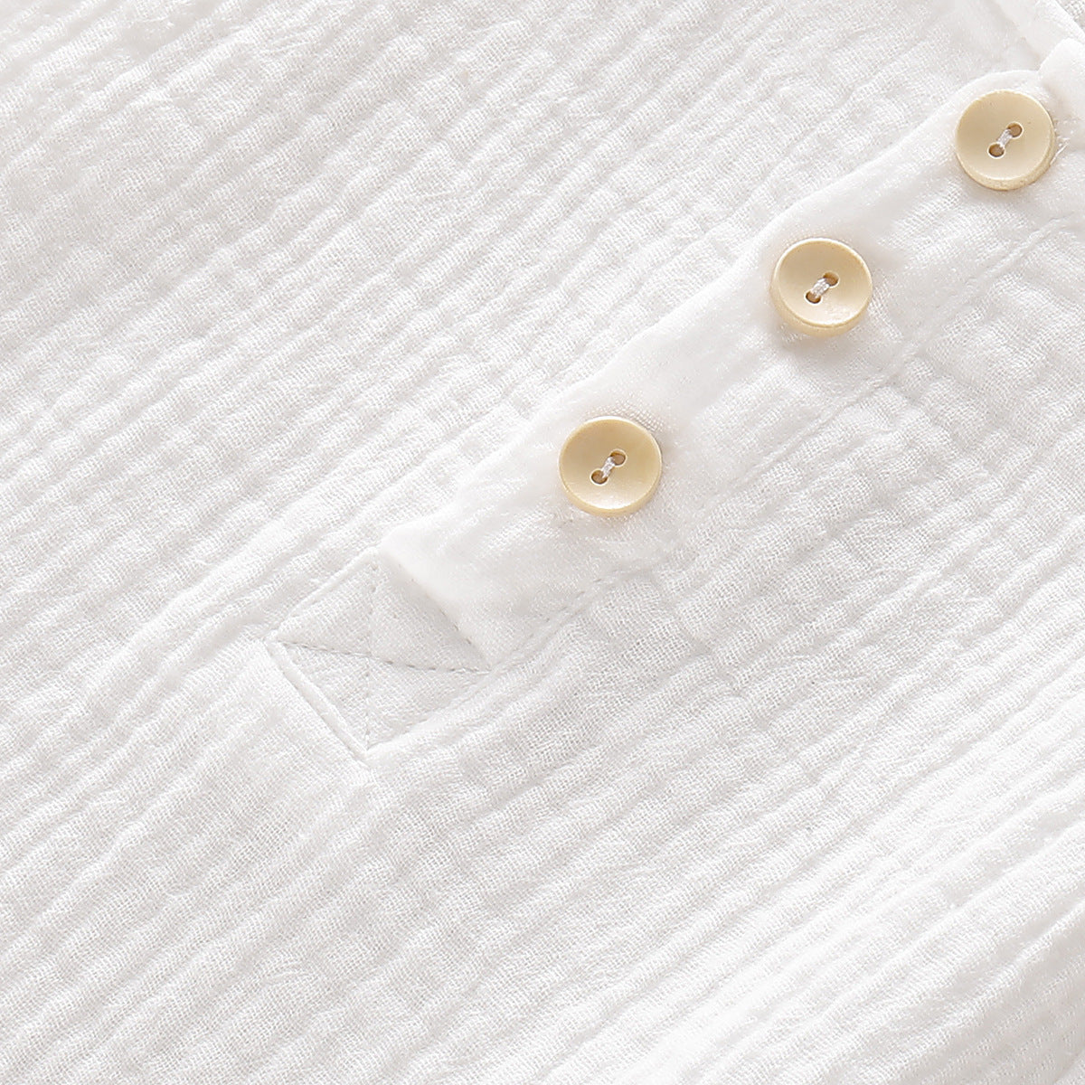 フロントボタンのデザインが分かるダブルガーゼ風ボディスーツ
