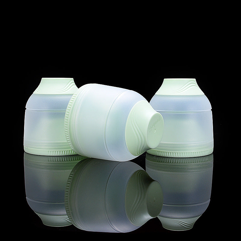 ピンクとグリーン2色の3層ミルクケースを並べたカラーバリエーション写真
