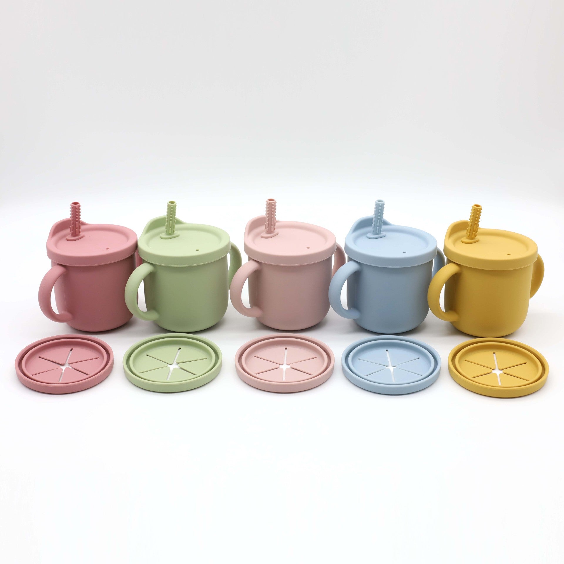 グレーブルー・ダークピンク・ライトピンク・マンゴー・オリーブの丸型シリコンベビーカップが横一列に並んでいる画像（シリコンベビーカップ）
