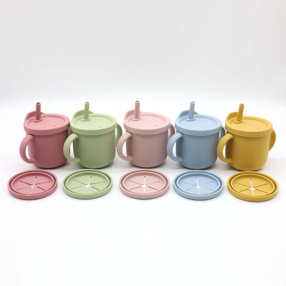 グレーブルー・ダークピンク・ライトピンク・マンゴー・オリーブの丸型シリコンベビーカップが横一列に並んでいる画像（シリコンベビーカップ）
