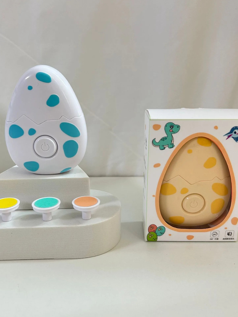 たまごデザインのキッズ電動爪やすり スカイブルー本体と研磨ヘッド3色 パッケージにイエロー本体（赤ちゃん爪削り）
