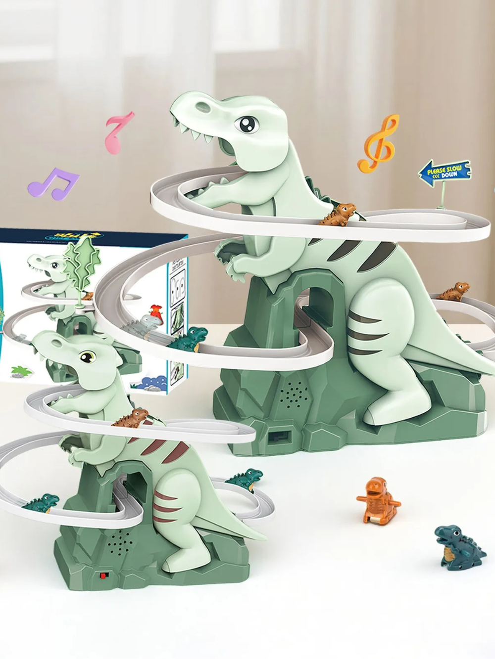 グリーン恐竜本体に渦巻きスロープが付いた電動スライドトラックを複数の恐竜カーが走っているイメージ写真
