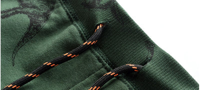 のびのび動けて毎日履きたくなる 子どもロングジョガーパンツ 恐竜総柄プリント コットンニット 2〜5歳