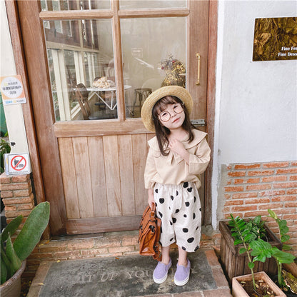 ベージュ生地にブラックドットのガールズパンツ
