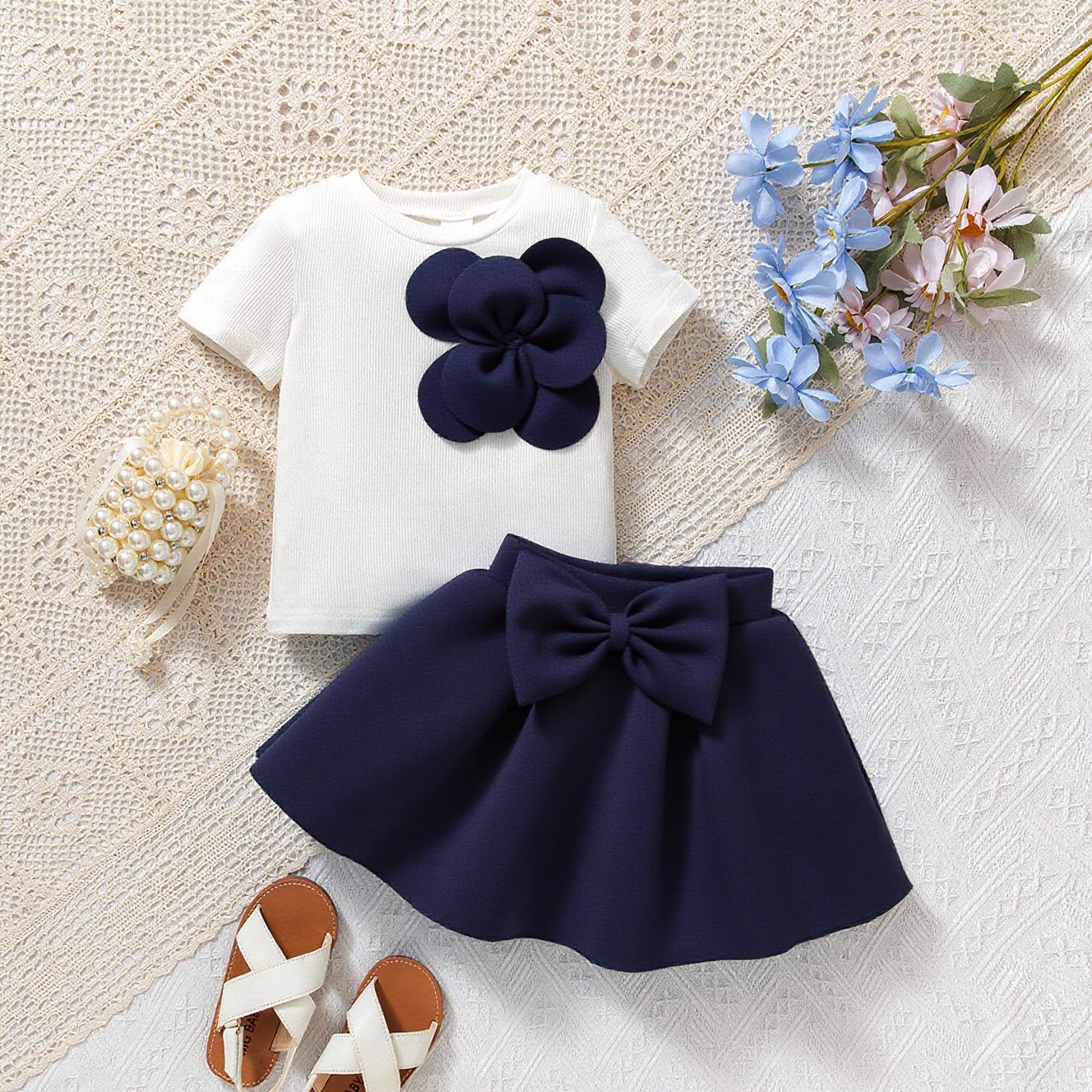 おでかけが華やぐ 女の子フラワーモチーフ半袖トップス＆リボンパフスカートセットアップ コットン 9-12ヶ月〜3-4歳