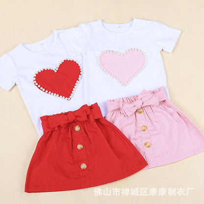 夏の可憐コーデが完成する 女の子半袖Tシャツ＆リボン付きスカートセット パール風ハートデザイン コットン（95%） 90〜120cm