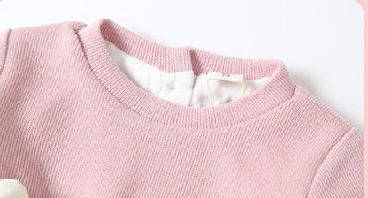 ハンガーに掛けた全体シルエットの写真
