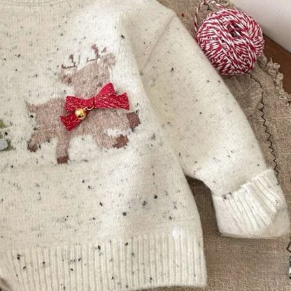 アプリコットカラーのベビーウール調セーター
