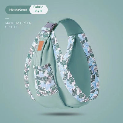 グリーン系カラーのリングスリングを斜めから見た外観（リングスリング・抱っこ紐）
