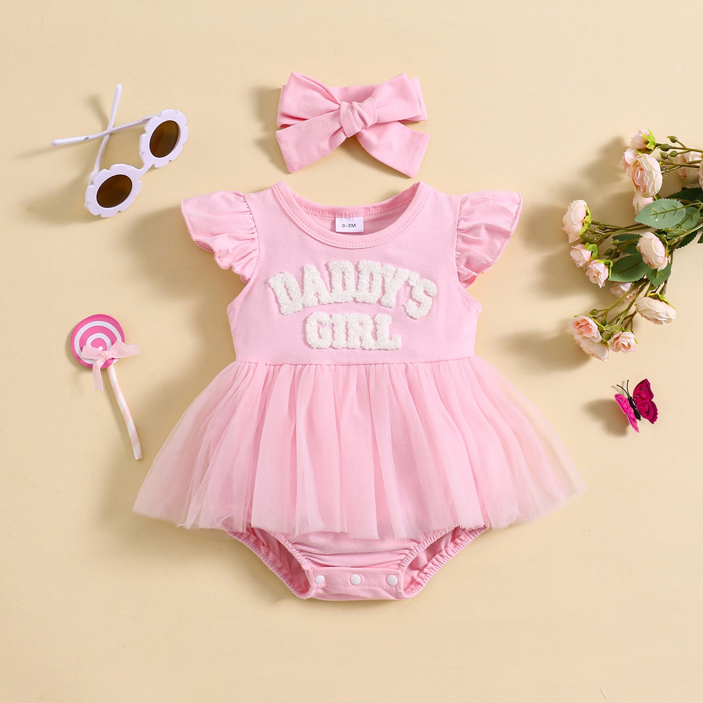 ピンクのロンパースワンピとヘアバンドのセット 全体イメージ
