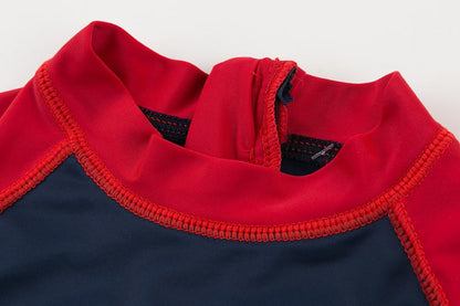 恐竜プリント ベビーボーイ用スイムロンパース｜半袖ラッシュタイプ・グリーン/レッド・1〜6ヶ月〜3〜4歳