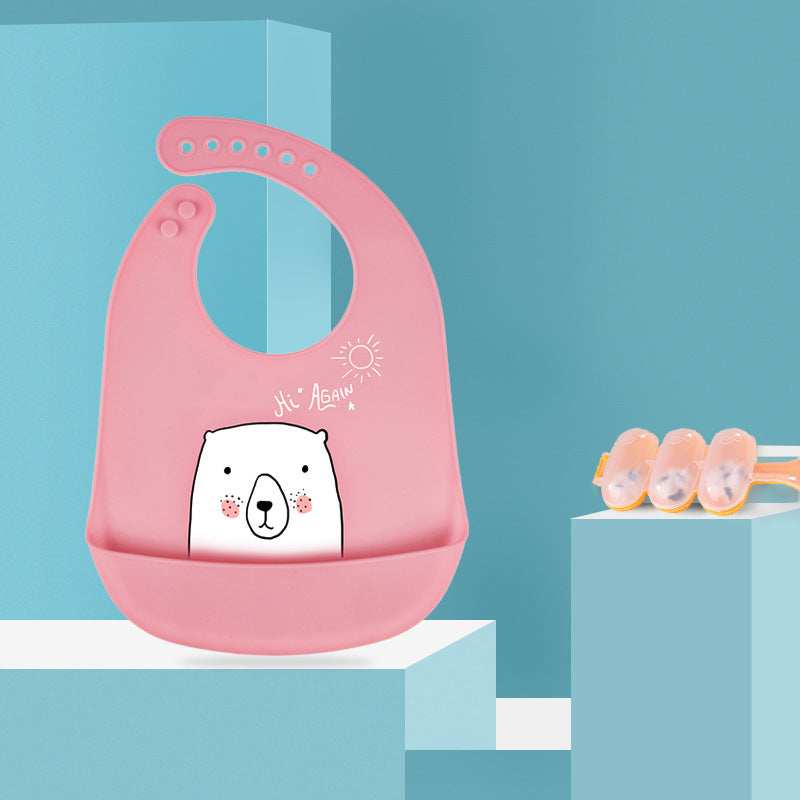 フックに掛けて乾かしているシリコンベビービブのキッチンインテリア風写真  
