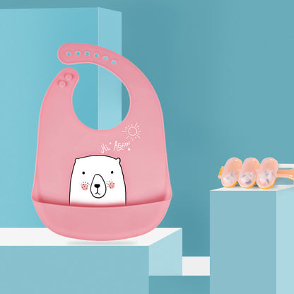 フックに掛けて乾かしているシリコンベビービブのキッチンインテリア風写真  
