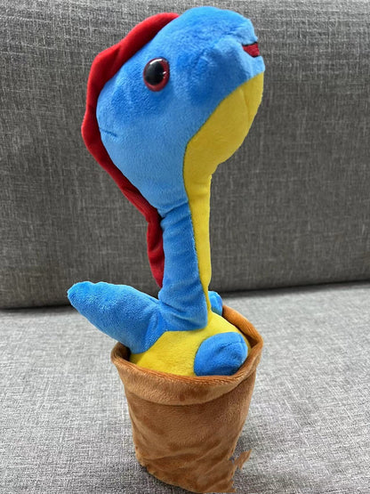 室内のソファ前に置いたブルーのポット型ダンシング恐竜トイ
