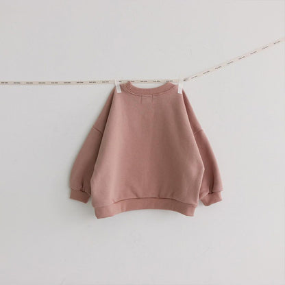 裾と袖口にリブが入った子どもコットンスウェット
