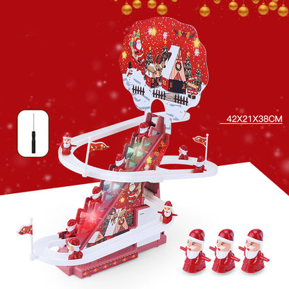 机の上に置かれたサンタ階段トラックおもちゃのサイズ感が分かる写真
