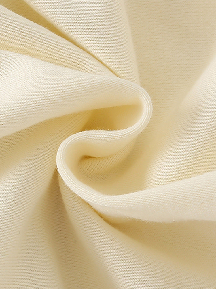 コットン生地と中わたパッドでやさしい着心地のキッズニット
