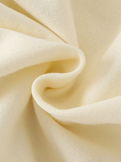 コットン生地と中わたパッドでやさしい着心地のキッズニット
