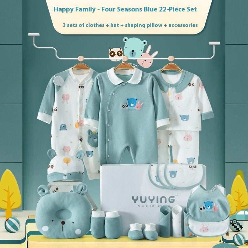 男女兼用カラーのベビー服をハンガーに掛けた様子
