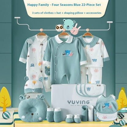 男女兼用カラーのベビー服をハンガーに掛けた様子
