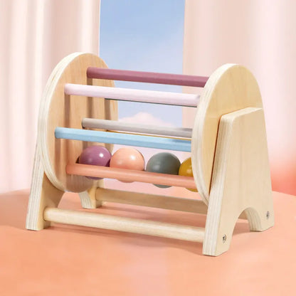 モンテッソーリ教育に基づく木製ローリングドラム 幼児用知育玩具
