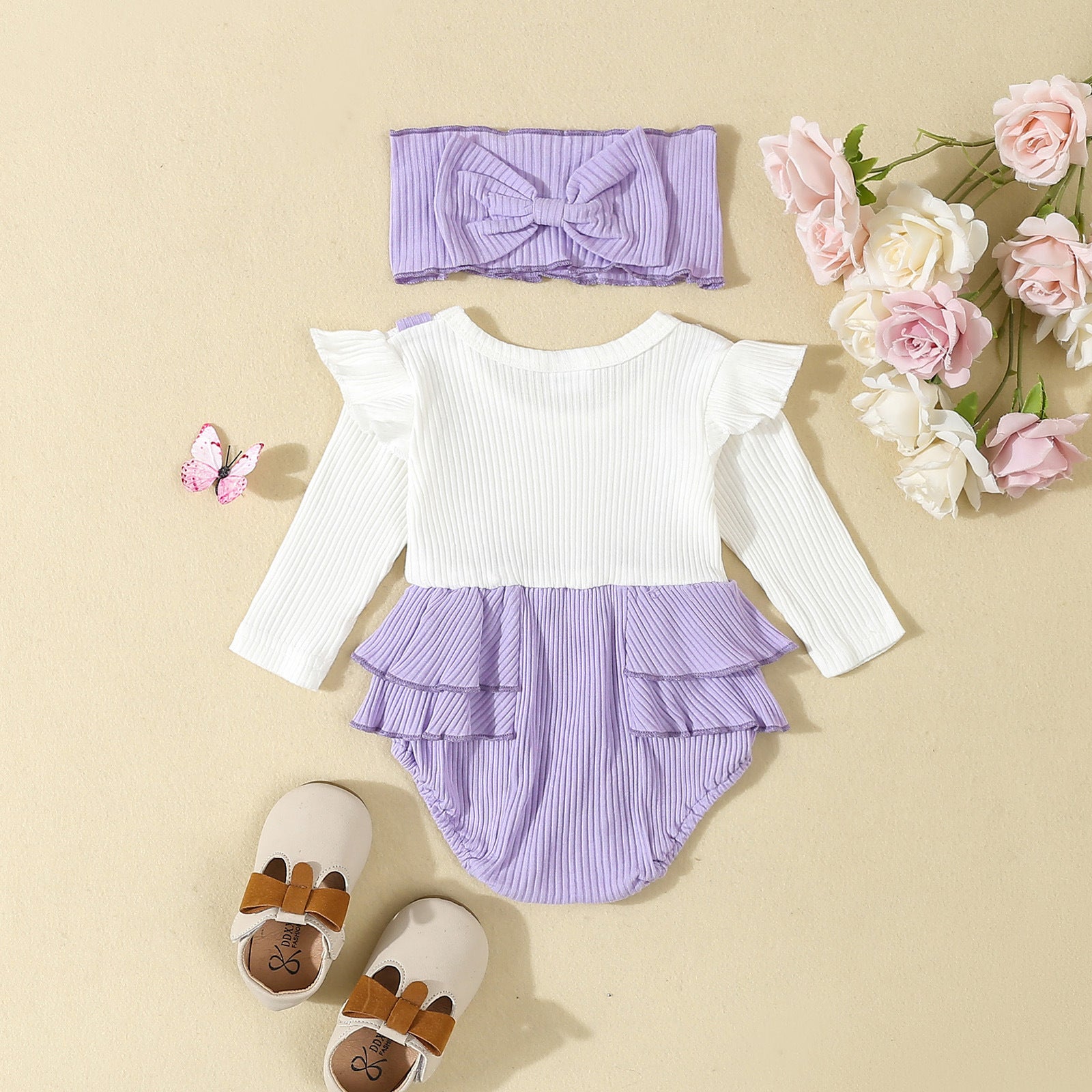 ピンクのベビー用カジュアルロンパース

