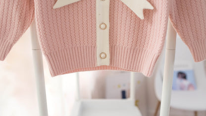 タロカラー（ライラック）のVネックベビーアウター
