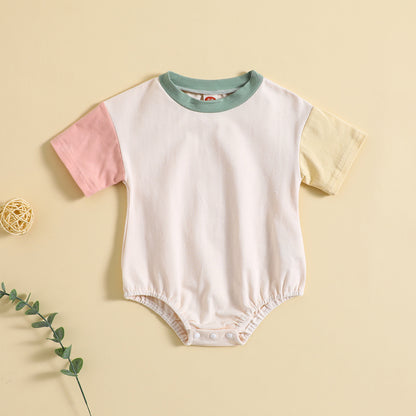 ピンク配色の半袖ボディスーツの平置き全体デザイン
