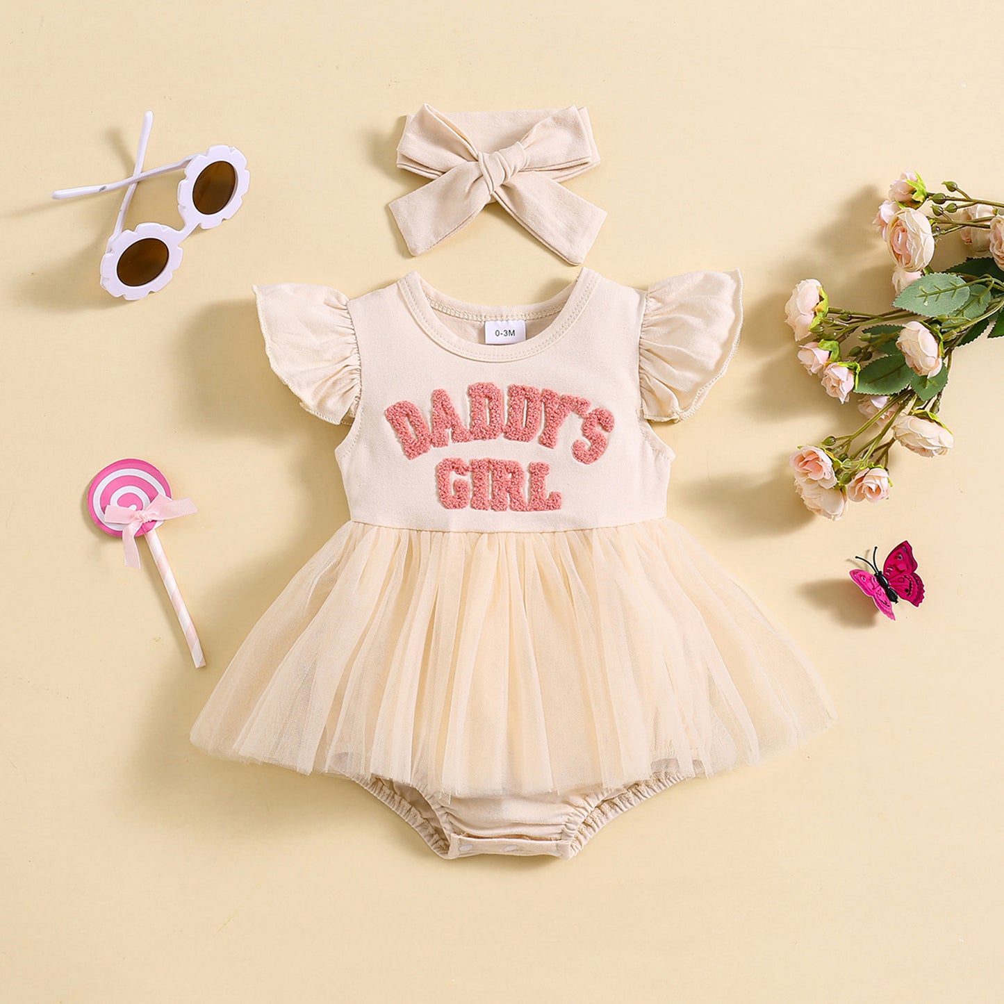 ミルキーホワイトのロンパースワンピとヘアバンドのセット 全体イメージ
