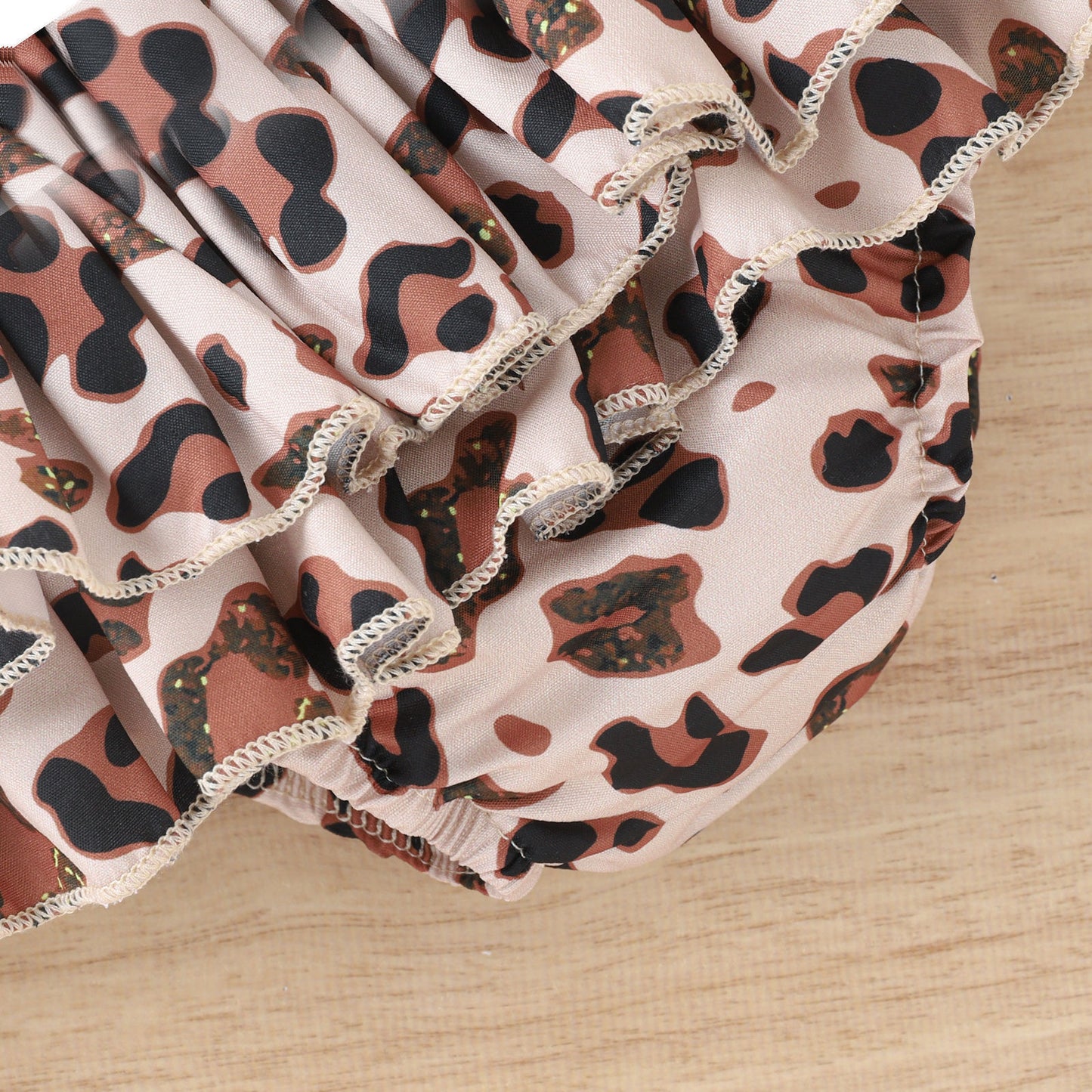 涼しげにおしゃれが完成する 女の子ホルターネックノースリーブ上下セット レオパード柄フリルスカート＋リボンヘアバンド付き コットン95% 70~100cm