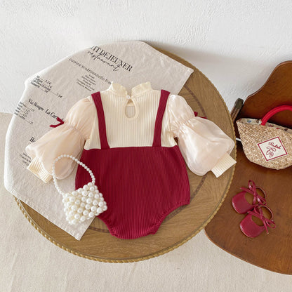 上品アプリコットで特別感をまとう 女の子ベビーロンパース リボンデザイン 長袖 コットン クラスA 66~90cm