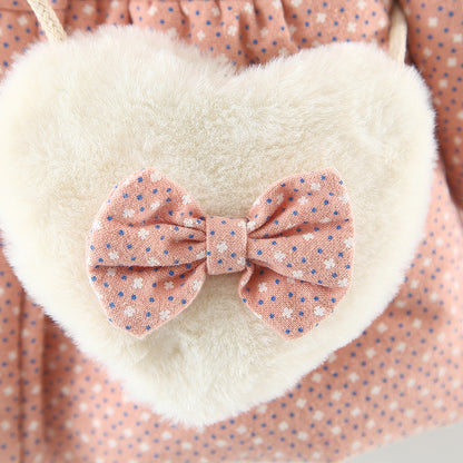 裾まわりのドット柄と無地部分のコントラストがかわいいデザイン
