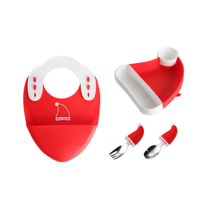 赤と白のクリスマスプレートとスプーン
