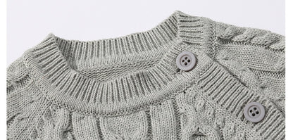 長袖コットンロンパースを着た赤ちゃん
