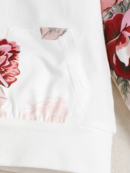 胸元と袖口の花柄切り替えが可愛いベビートップスのデザインアップ
