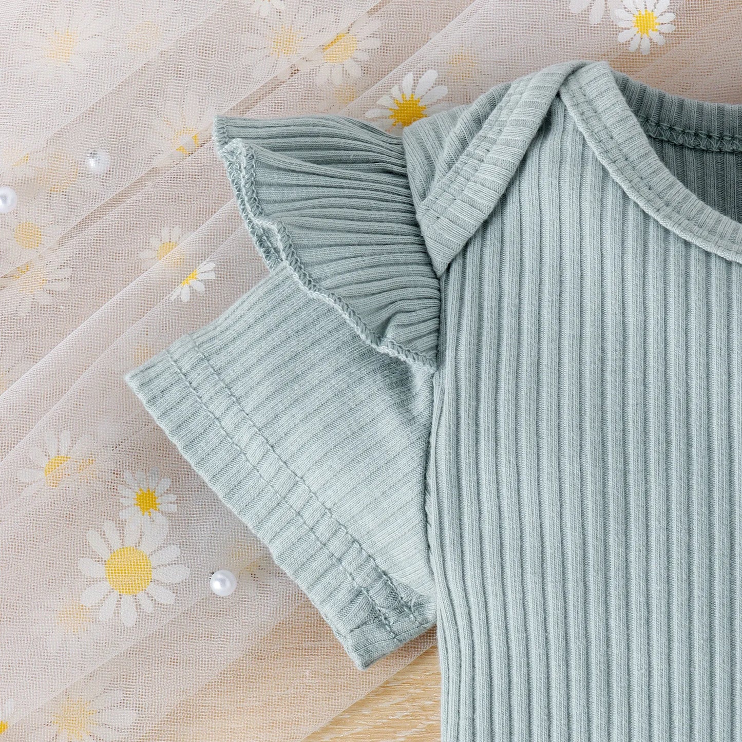 半袖リブボディスーツのリブ生地の質感が分かる素材アップ
