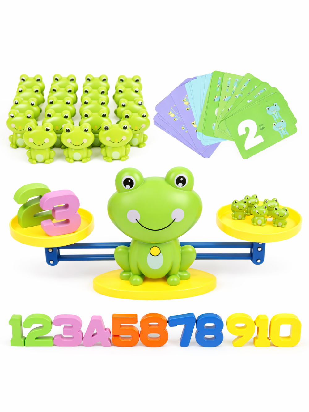 白背景のスタジオ撮影。カエル型のバランスおもちゃ（青いバーと黄色い皿）を中心に、カエルの小さなコマ、数字カード、カラフルな数字ブロック（1〜10）がセットで並んでいる。
